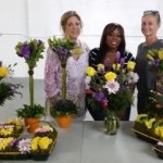 women with sucess in their flower design class