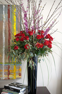 flowers-in-black-vase-with-books