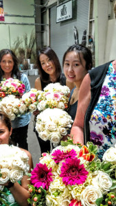 several-women-holding-flowers