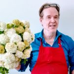 Mike holding Flowers